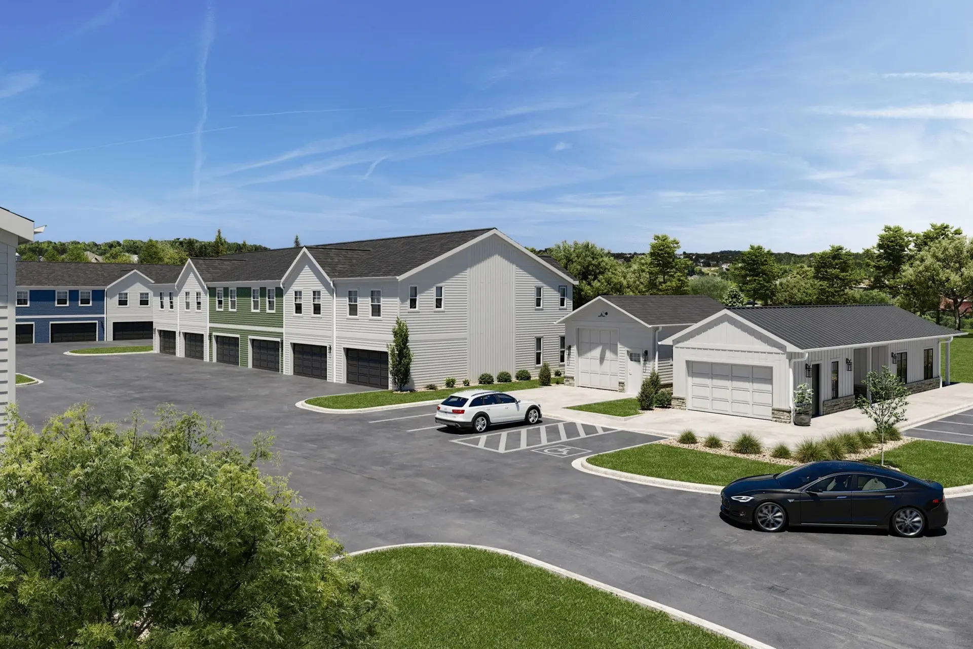 A modern rental community with wood-look two-story buildings, garages, landscaped areas, parked cars, and a clear blue sky.